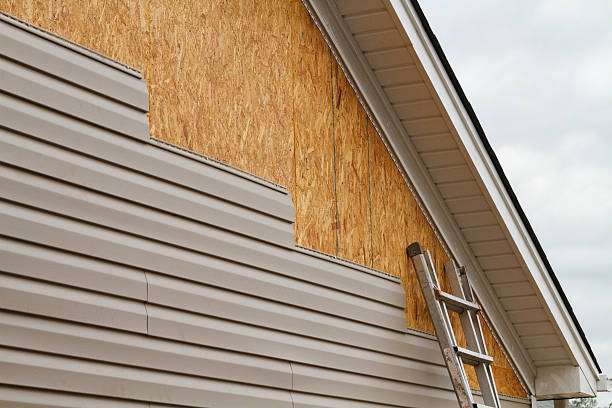 Professional Emergency Siding Repair technician working in Peabody, MA